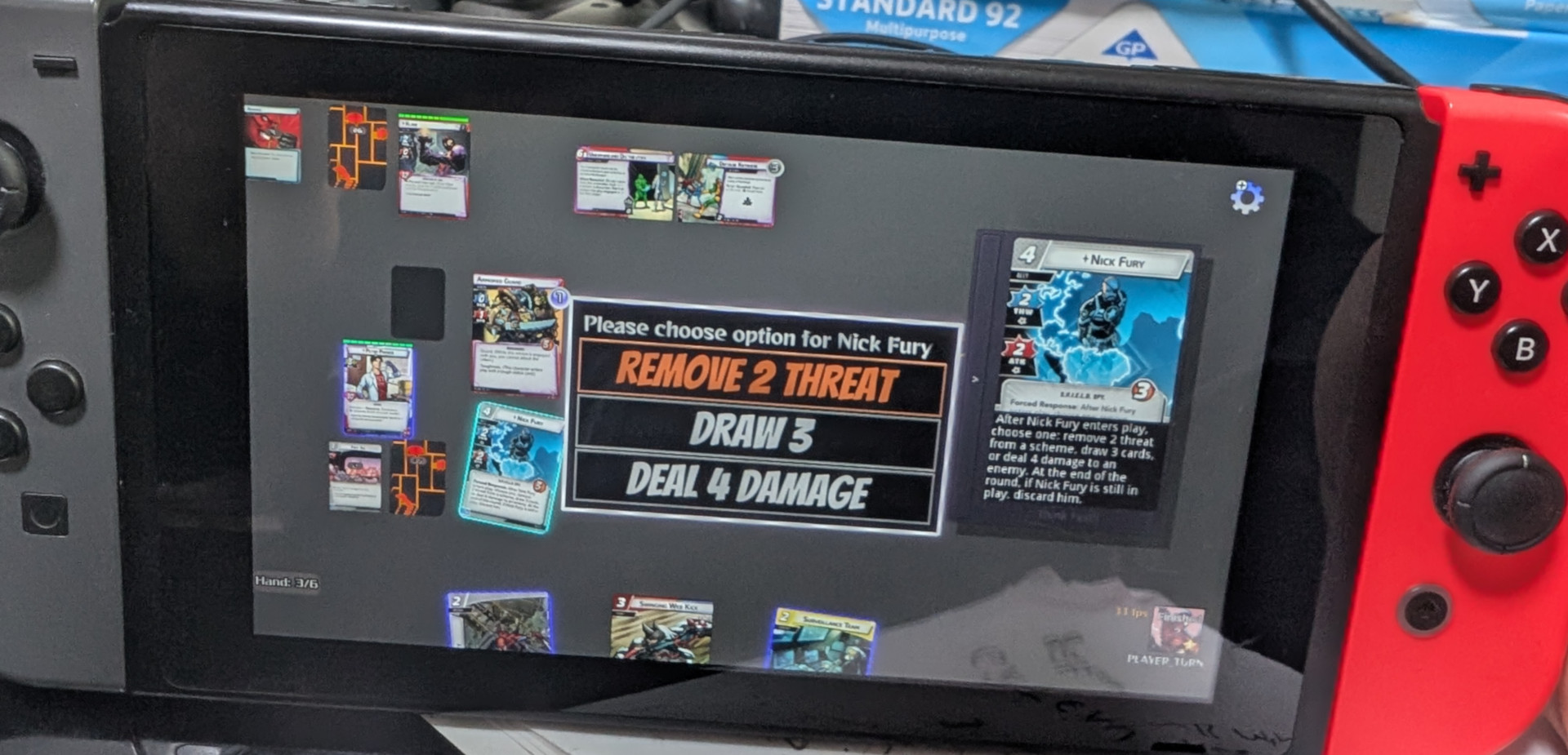 Warnel Chawpiovs homebrew release screen with Marvel Champions-style cards on a retro gaming setup