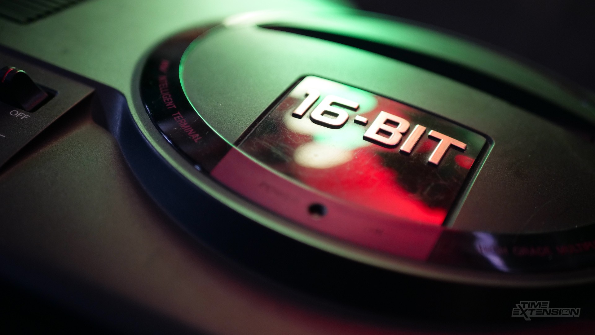 A retro Sega console setup representing the 16-bit era and the Sega Nintendo rivalry.